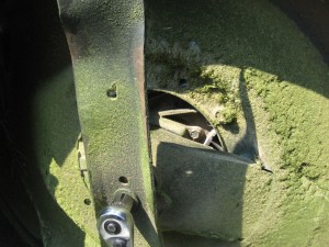Underside of mower, removing blade