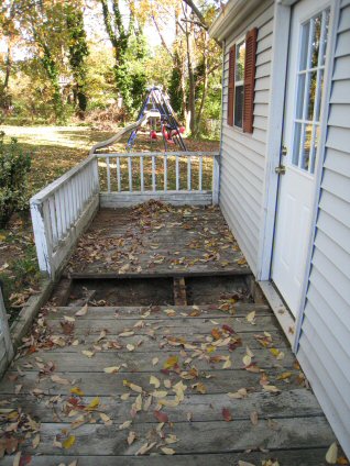 old deck with rotted wood