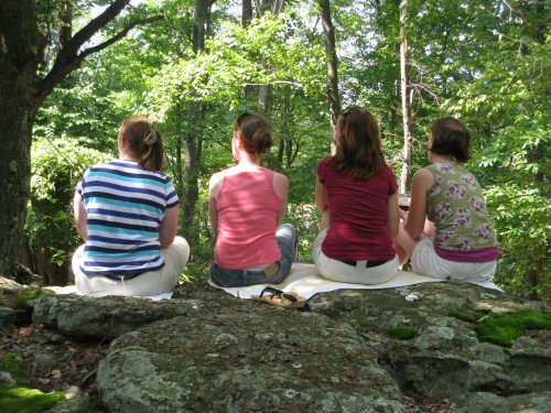 ladies-sitting-on-rock-near-the-deck