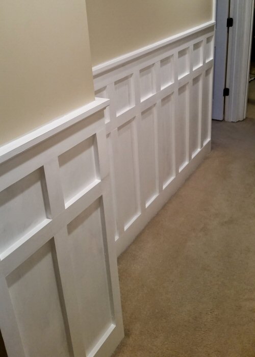 Board and Batten Painted White Down Hallway