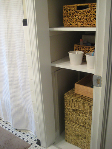 Habitat for Humanity Summer Before and After Closet Door After with wicker baskets
