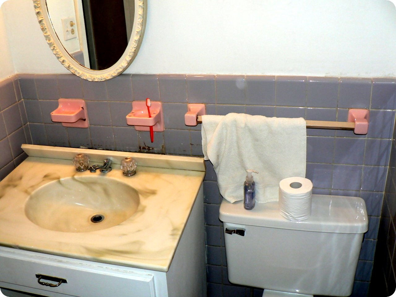 old bathroom sink and toilet