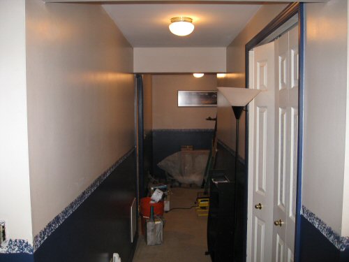 basement hallway before with border