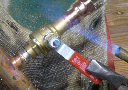 propane torch and copper pipe