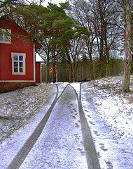 house-with-snow-tracks