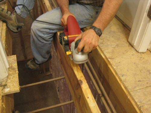 Level an Uneven, Crowning Subfloor by Planing / Sanding Joists