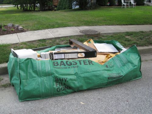 https://www.oneprojectcloser.com/wp-content/uploads/2010/07/Bagster-Full-of-Home-Construction-Trash.JPG