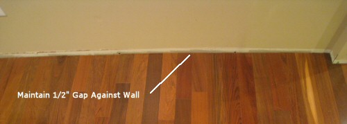 maintain gap between hardwoods and wall