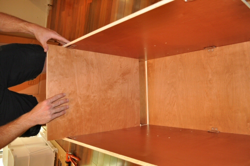 assemble the bottom of a solid wood cabinet from In Stock Kitchens