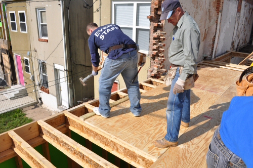 tighten plywood subfloor to the next sheet using a hammer