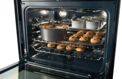 open frigidaire wall oven with half rack